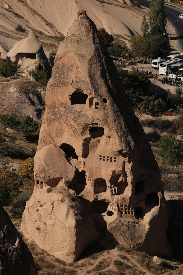 Explore the unique rock formations in Cappadocia, Turkey, known for their ancient history and stunning landscape.